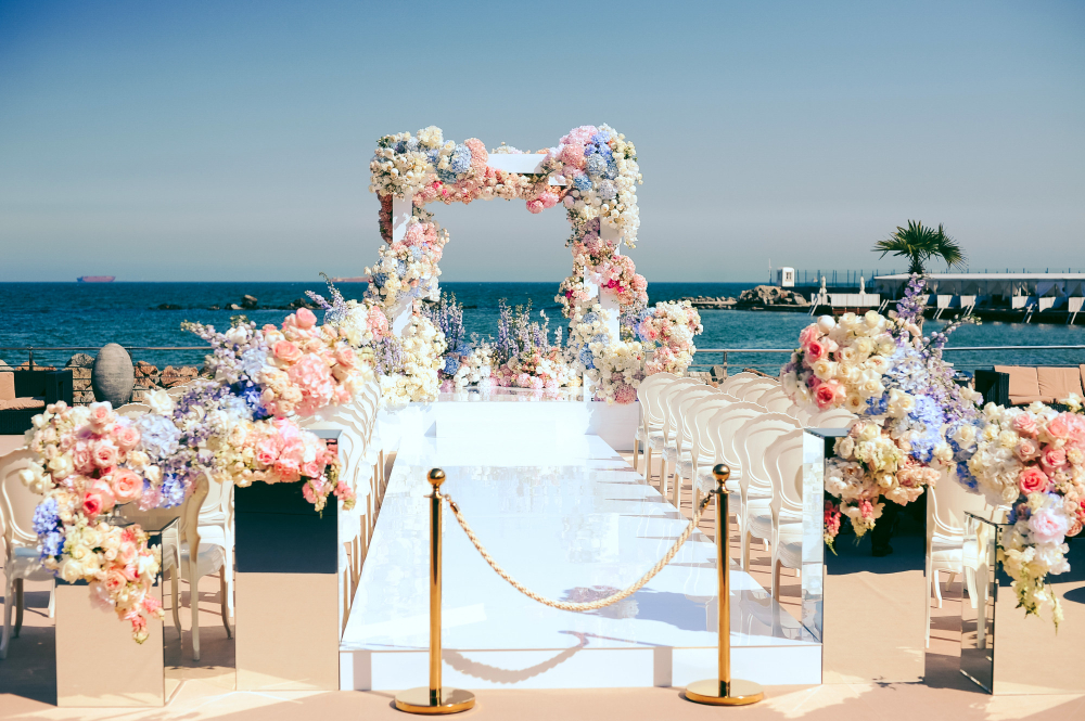 wonderful-wedding-ceremony-place-near-sea-decorated-by-flowers
